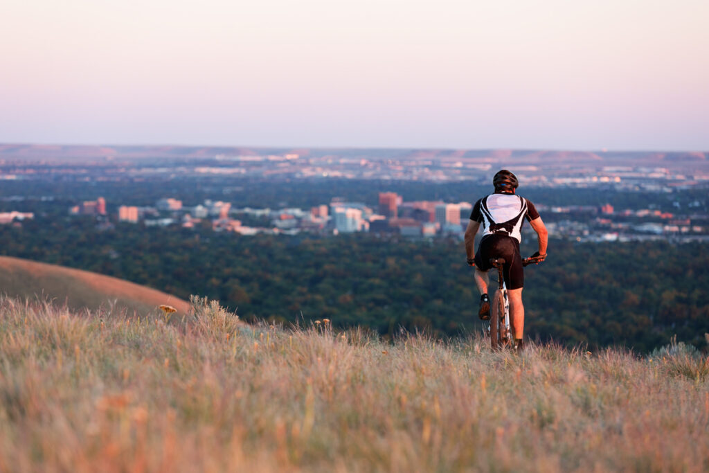 Man on mountain bike riding in the foothills 