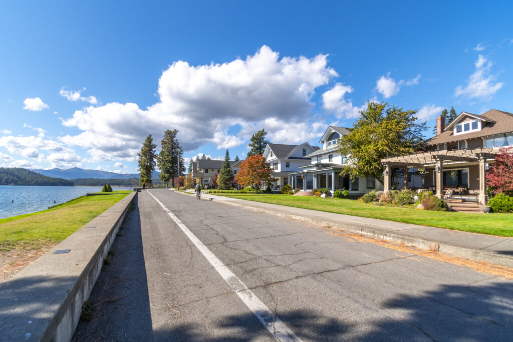 Luxury homes across from the lake in the rural mountain community of Coeur d'Alene, Idaho. The Fort Grounds district is a historic district next to the city beach, park and resort.