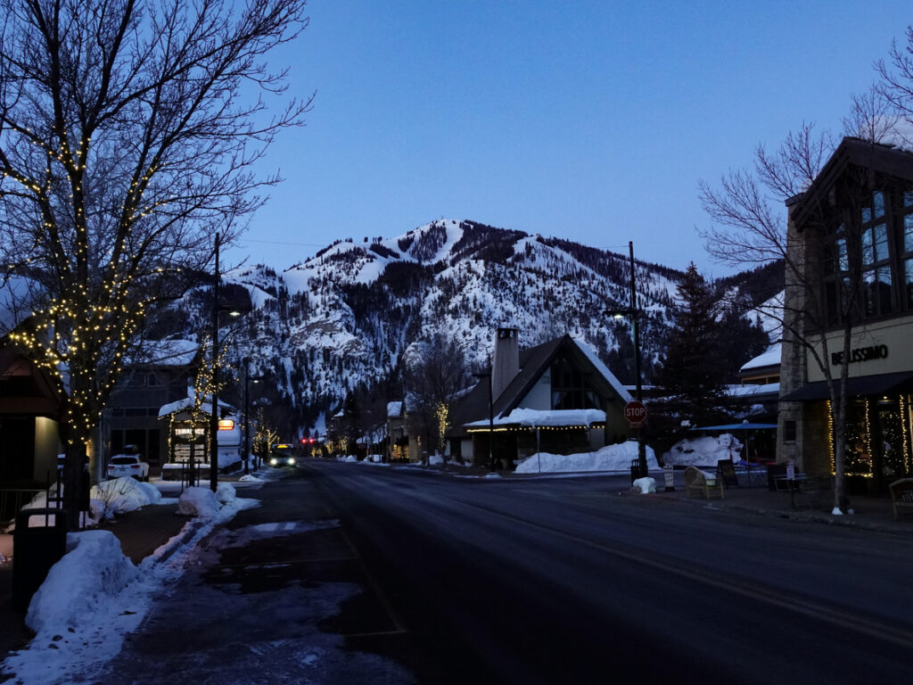 Ketchum, Idaho, USA-January 29, 2023: Pre dawn street view of Ketchum, Idaho with Sun Valley ski mountain behind.